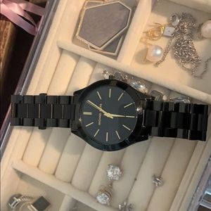Black and gold Michael Kors watch